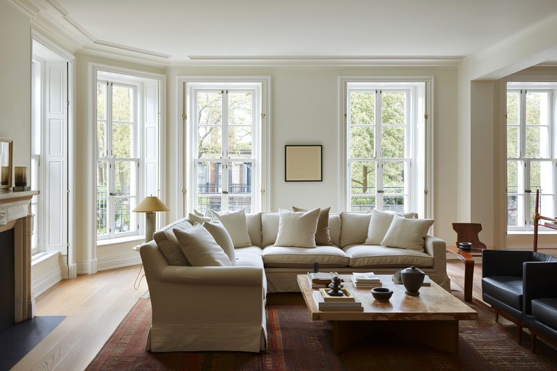 Bright living room with white uPVC casement windows